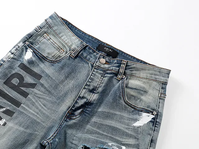 Amiri Distressed Logo-Print Light Blue Paint-Splatter Slim-Fit Jeans 4