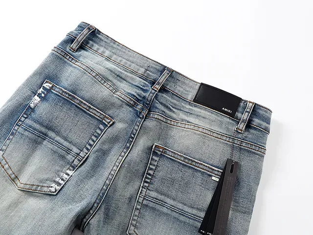 Amiri Distressed Logo-Print Light Blue Paint-Splatter Slim-Fit Jeans 5