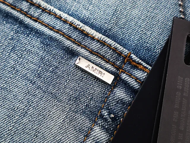 Amiri Distressed Logo-Print Light Blue Paint-Splatter Slim-Fit Jeans 6