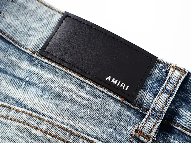 Amiri Distressed Logo-Print Light Blue Paint-Splatter Slim-Fit Jeans 7