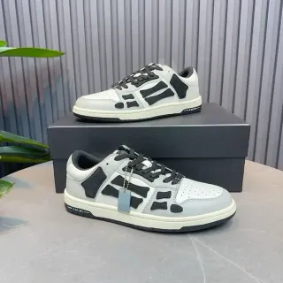 Amiri Skel Top Low Light Gray and Black Lifestyle Sneakers