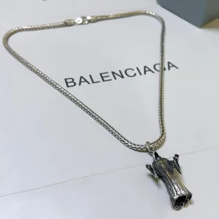 Balenciaga Cadena de serpiente trenzada de plata figura escultórica con túnica colgante joyería