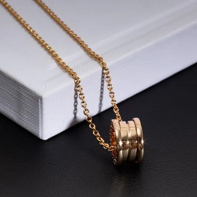 Bvlgari B.zero1 Tubogas bague empilée colier doré 3