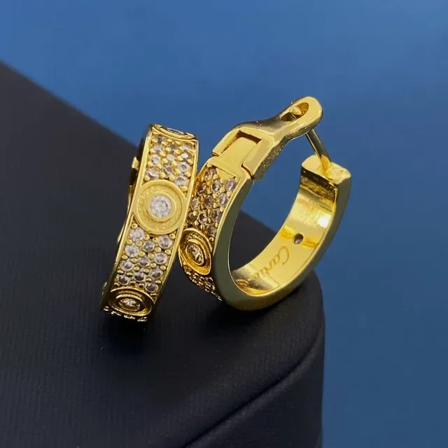 Boucles d'oreilles Cartier en or pavé de cristaux à charnière 2