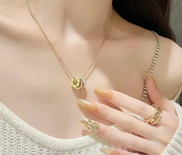 Collier Cartier Trinity à trois anneaux entrelacés en or bicolore 6