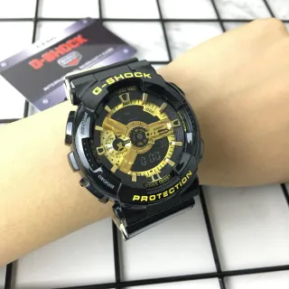 Casio G-Shock GA-100 Reloj deportivo negro y oro