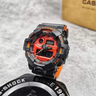 Casio G-Shock GA-100 Montre Sportive Noire et Orange