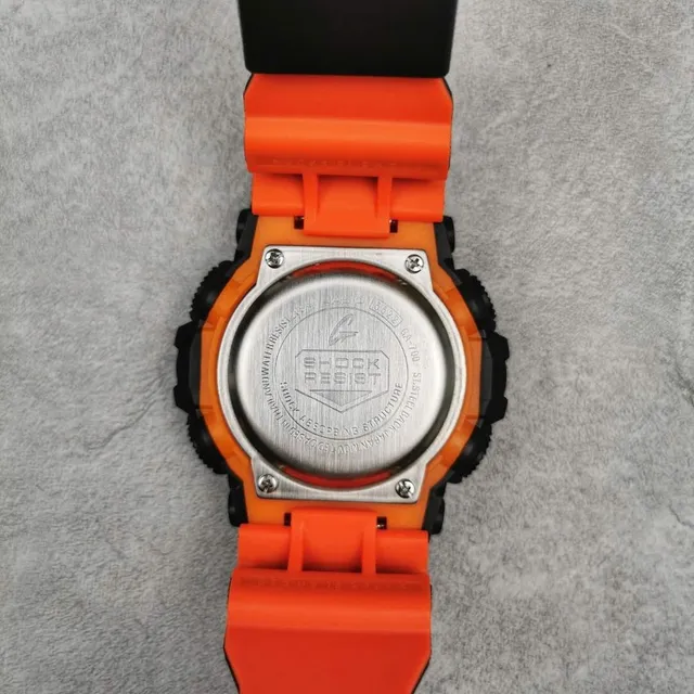 Casio G-Shock GA-100 Montre Sportive Noire et Orange 2