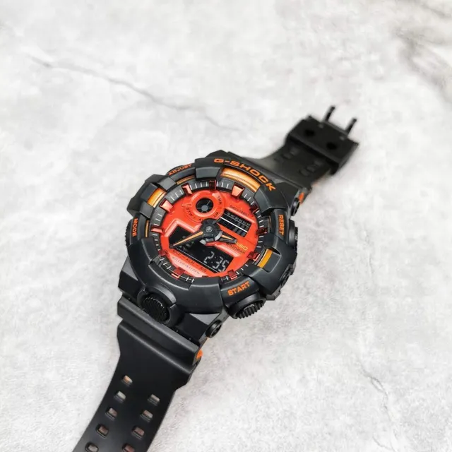 Casio G-Shock GA-100 Montre Sportive Noire et Orange 3