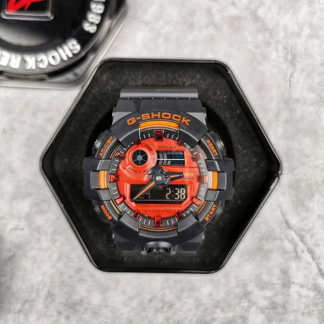 Casio G-Shock GA-100 Montre Sportive Noire et Orange 7