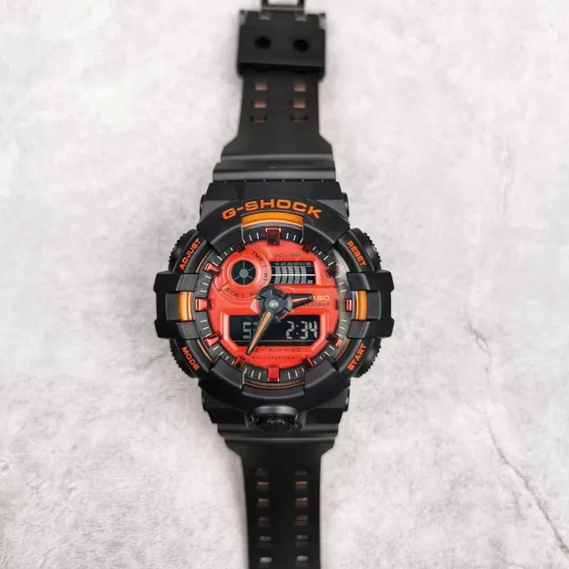 Casio G-Shock GA-100 Montre Sportive Noire et Orange 8