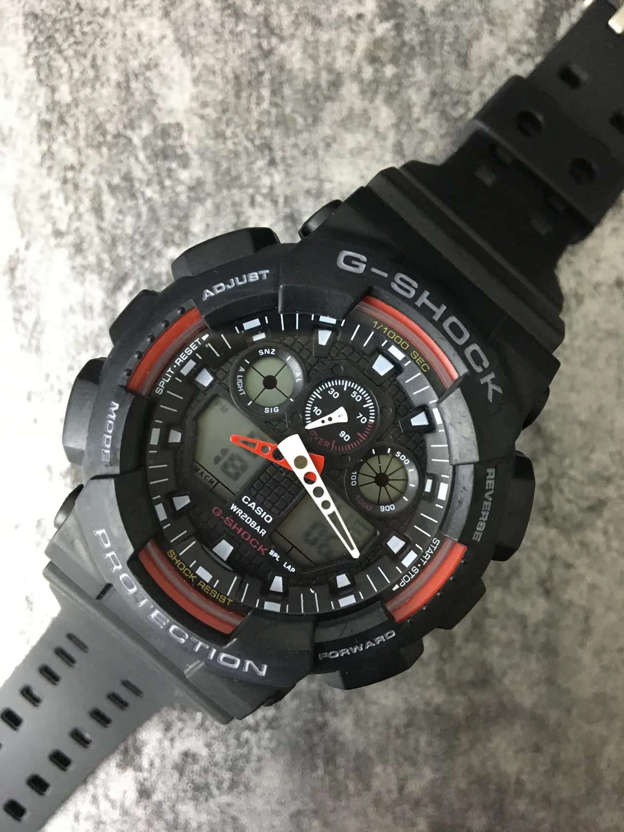 Casio G-Shock GA-100 Montre Sportive Noire et Rouge 5