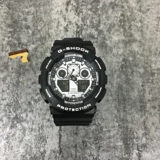 Casio G-Shock GA-100 ساعة رياضية أسود وأبيض