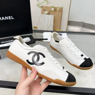 Chanel White Black Low-Top Lace-Up Lifestyle Sneakers