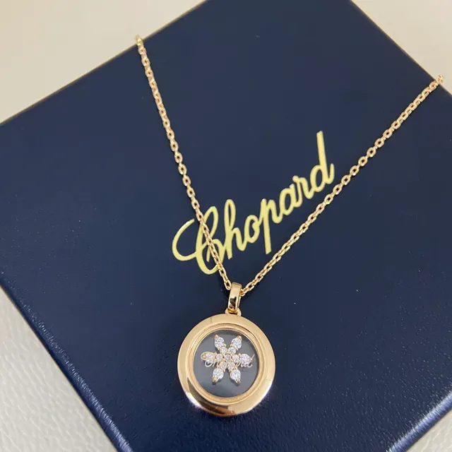Chopard Collier avec Pendentif Locket Rotatif en Or et Argent Motif Flocon de Neige Diamant 4