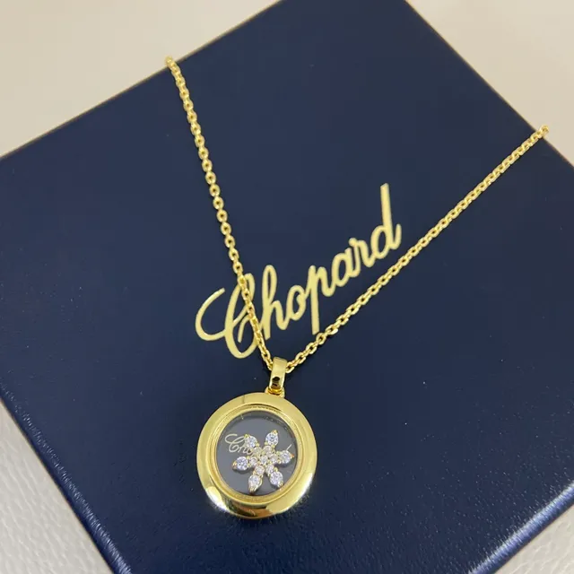 Chopard Collier avec Pendentif Locket Rotatif en Or et Argent Motif Flocon de Neige Diamant 5