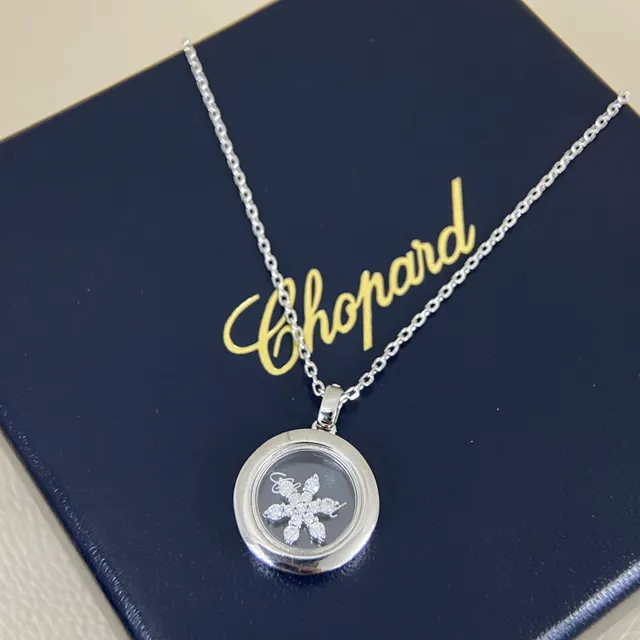 Chopard Collier avec Pendentif Locket Rotatif en Or et Argent Motif Flocon de Neige Diamant 6