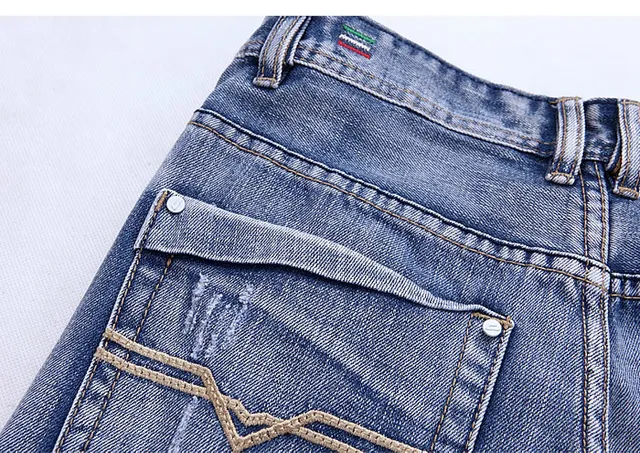 Diesel Lumen Distressed Medium-Wash Blue Jeans 7