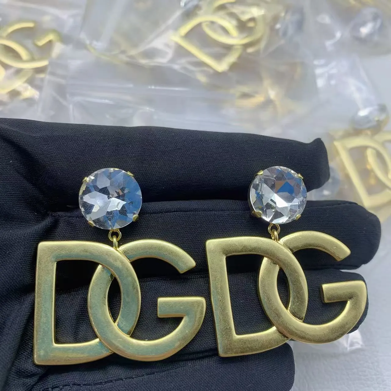 أقراط قطرة Dolce & Gabbana DG لوجو كريستال 2