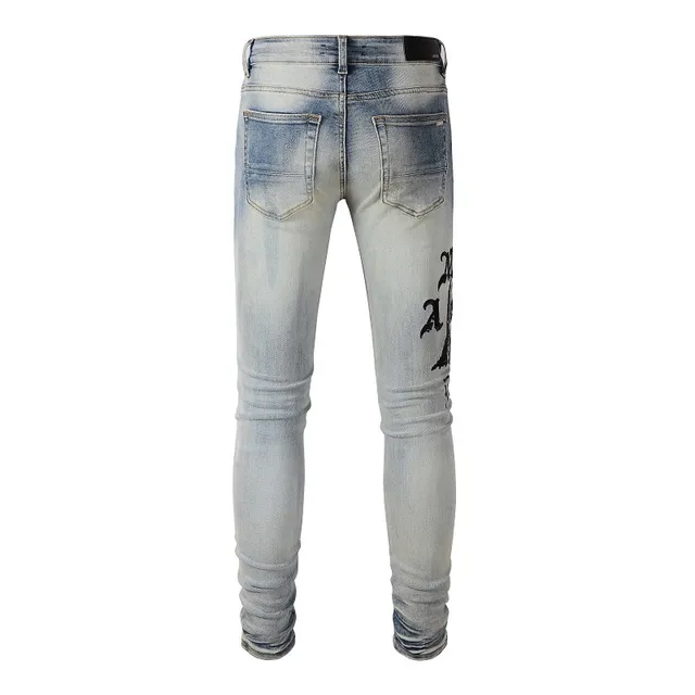 Distressed Light-Wash Graphic-Print Slim-Fit Jeans 9