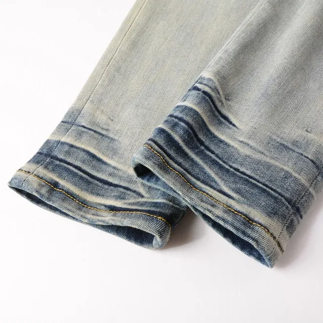 Distressed Light-Wash Graphic-Print Slim-Fit Jeans 13