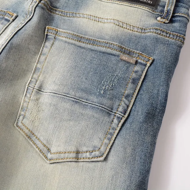 Distressed Light-Wash Graphic-Print Slim-Fit Jeans 15