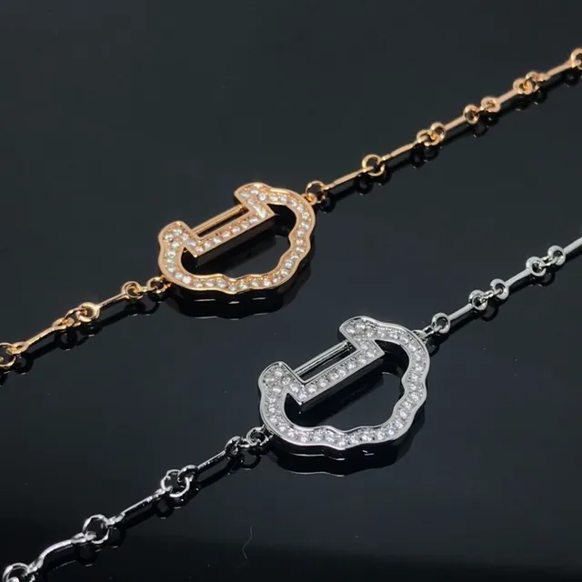 Bracelet en or et argent avec motif central en forme de U orné de pierres Pavé-Stone 2