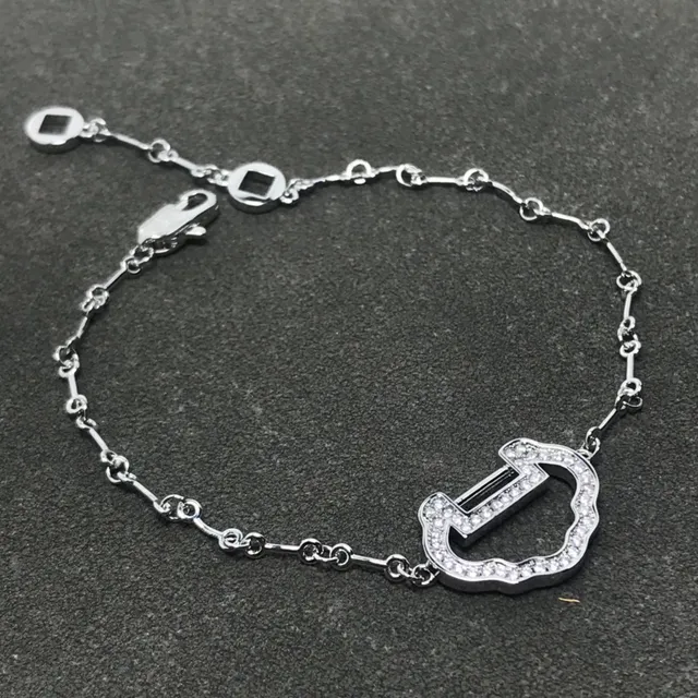 Bracelet en or et argent avec motif central en forme de U orné de pierres Pavé-Stone 4