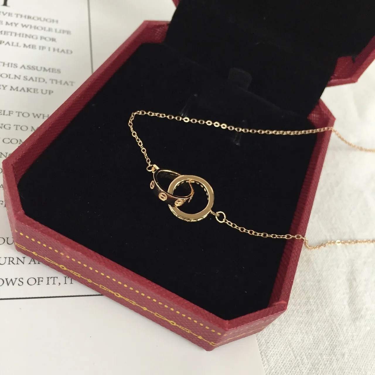 Gold-Tone Interlocking Double-Ring Pendant Necklace 5