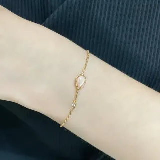 سوارة سلاسل ملتوية بلون ذهبي مع حجر دمعة