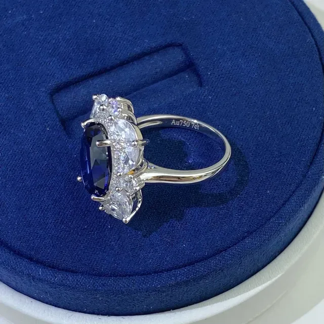 Halo-Set Oval Blue and Emerald-Cut Green Gemstone Rings 2