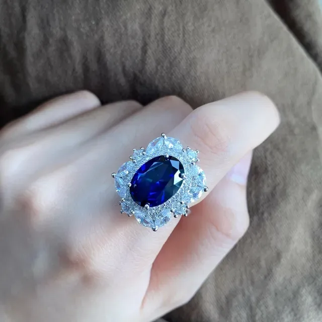 Halo-Set Oval Blue and Emerald-Cut Green Gemstone Rings 7