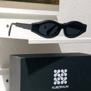 KUBORAUM Sculpted Oval Matte Black Sunglasses