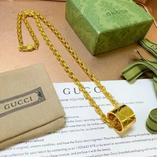Gucci Gold Rope-Link Chain Cylindrical GG-Embossed Pendant Necklace