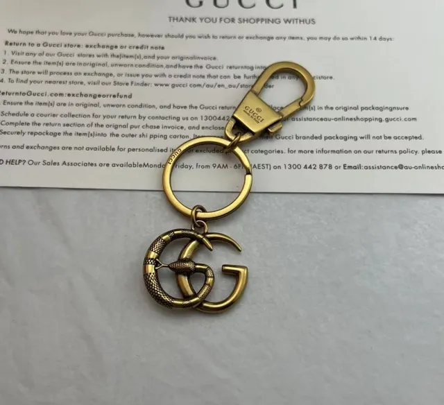 Gucci Interlocking G motivo ouro prata acabamento metálico pulseira 3