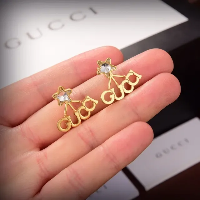 Gucci Logo Star Boucles d'oreilles dorées transparentes 4