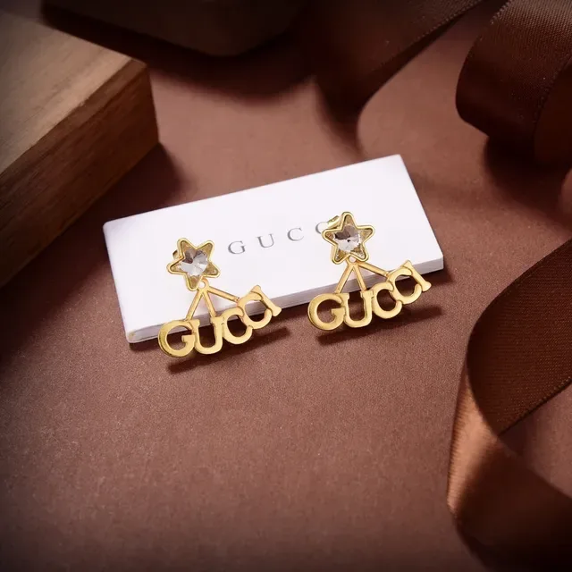 Gucci Logo Star Boucles d'oreilles dorées transparentes 6