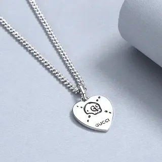 Gucci Silver Heart-Shaped Pendant Engraved Skull Motif Necklace