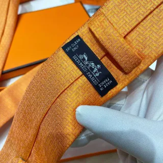 Hermès H-Motif Woven Pumpkin Yellow Necktie