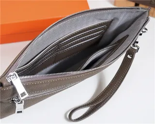 Hermès Navy Textured Pebbled Leather Embossed H Logo Wristlet 2