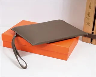 Hermès Navy Textured Pebbled Leather Embossed H Logo Wristlet 5