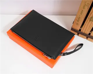 Hermès Navy Textured Pebbled Leather Embossed H Logo Wristlet 17