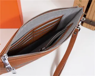 Hermès Navy Textured Pebbled Leather Embossed H Logo Wristlet 21