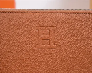 Hermès Navy Textured Pebbled Leather Embossed H Logo Wristlet 24