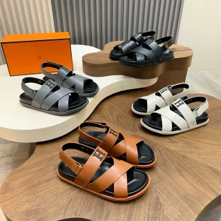 Hermès Oran Brown Black Crossed Leather Straps Prominent H-Buckle Hardware Gladiator Sandals