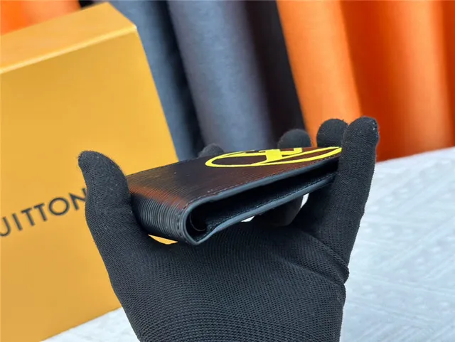 Louis Vuitton Black Yellow Epi Leather Texture Bold Circular Monogram Short Wallet 17