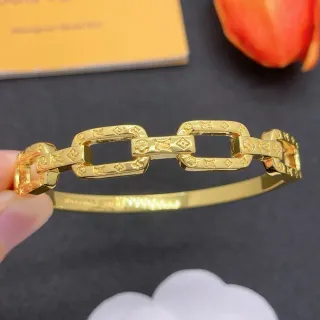 Louis Vuitton Chain Reaction Embossed Monogram Gold-Tone Link Bracelet