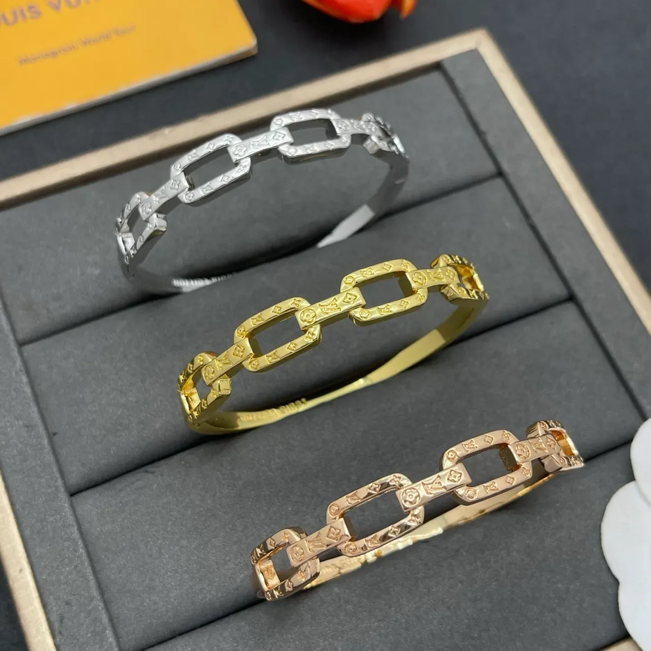 Louis Vuitton Chain Reaction Embossed Monogram Gold-Tone Link Bracelet 2