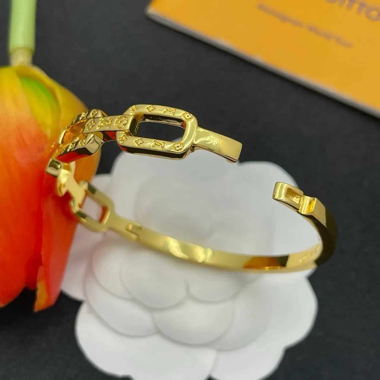 Louis Vuitton Chain Reaction Embossed Monogram Gold-Tone Link Bracelet 4