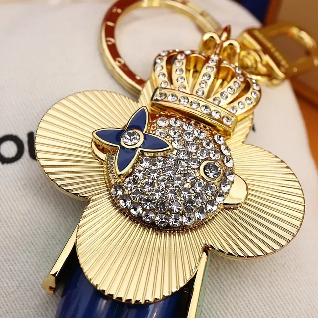 Louis Vuitton Broche com Encanto Floral Chaveiro em Ouro e Cristal Azul 3